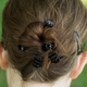 Illustration for article titled 6 Sexy Updos That, Full Disclosure, Will Slightly Increase Your Risk Of Being Snagged By A Helicopter Dangling A Hook On A Long Rope